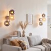 Applique murale Gastor moderne en set de 2, trois abat-jour ronds en verre fumé et ambre