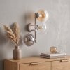 Applique murale moderne Gastor, abat-jour ronds verticaux en verre fumé, ambre et clair