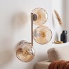 Applique murale moderne Koyoto à 3 abat-jour sphériques ambrés en verre cannelé