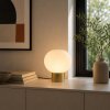 Brilliant lampe champignon Fanny, abat-jour rond en verre blanc, pied couleur laiton